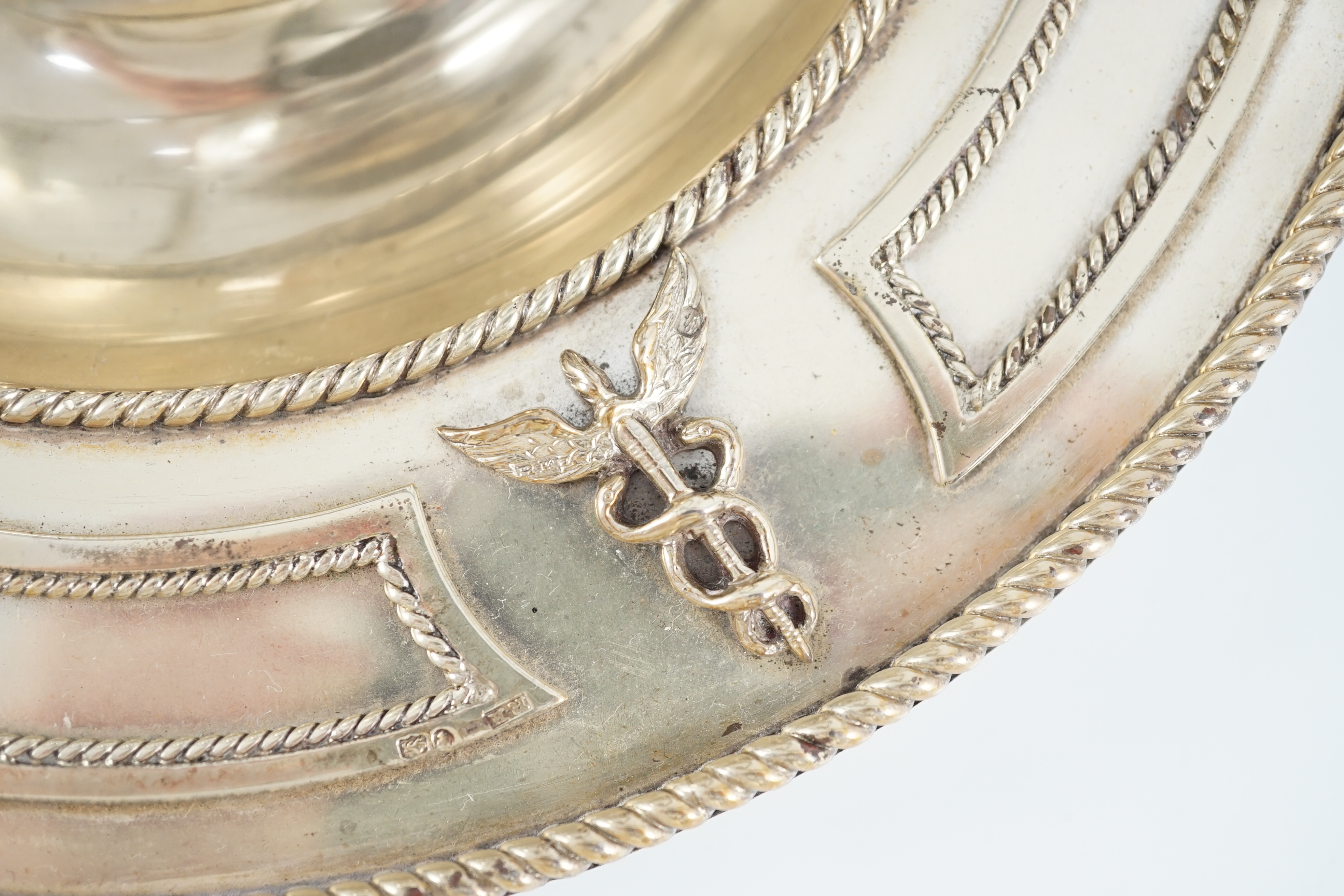 A Victorian silver gilt circular inkstand, by Robert Hennell III
